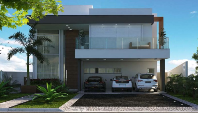 A imagem mostra a fachada da casa quadrada assinada pelo arquiteto Caio Pelisson com dois andares. A casa é feita em tons de branco e madeira, possui uma garagem aberta com três carros e uma varanda no andar superior.