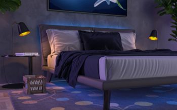 Foto que ilustra matéria sobre quarto neon mostra uma cama feita, com uma uma luz neon azul que aparece por detrás da cabeceira.