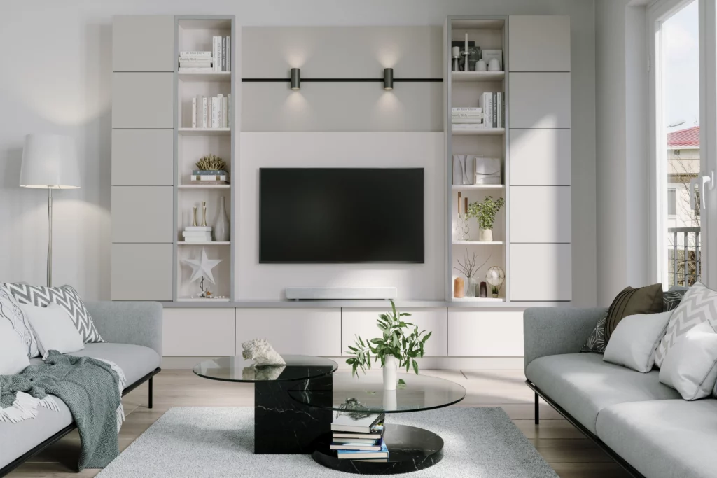 Imagem de um rack branco que ocupa toda a extensão da parede em uma sala de estar com sofás, mesa de centro e televisão 