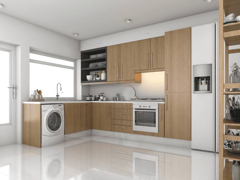 Cozinha e lavanderia integradas com eletrodomésticos embutidos. Imagem disponível em Canva.