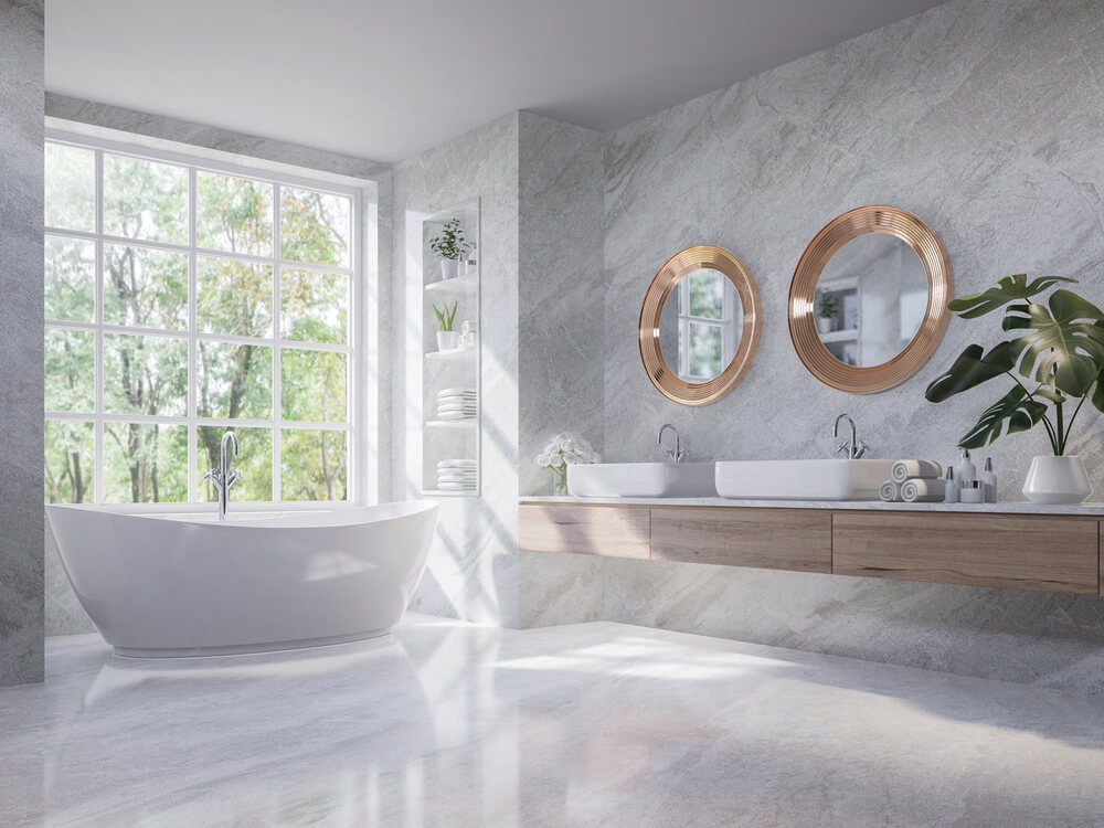 Foto que ilustra matéria sobre tipos de piso mostra um banheiro com piso de mármore.