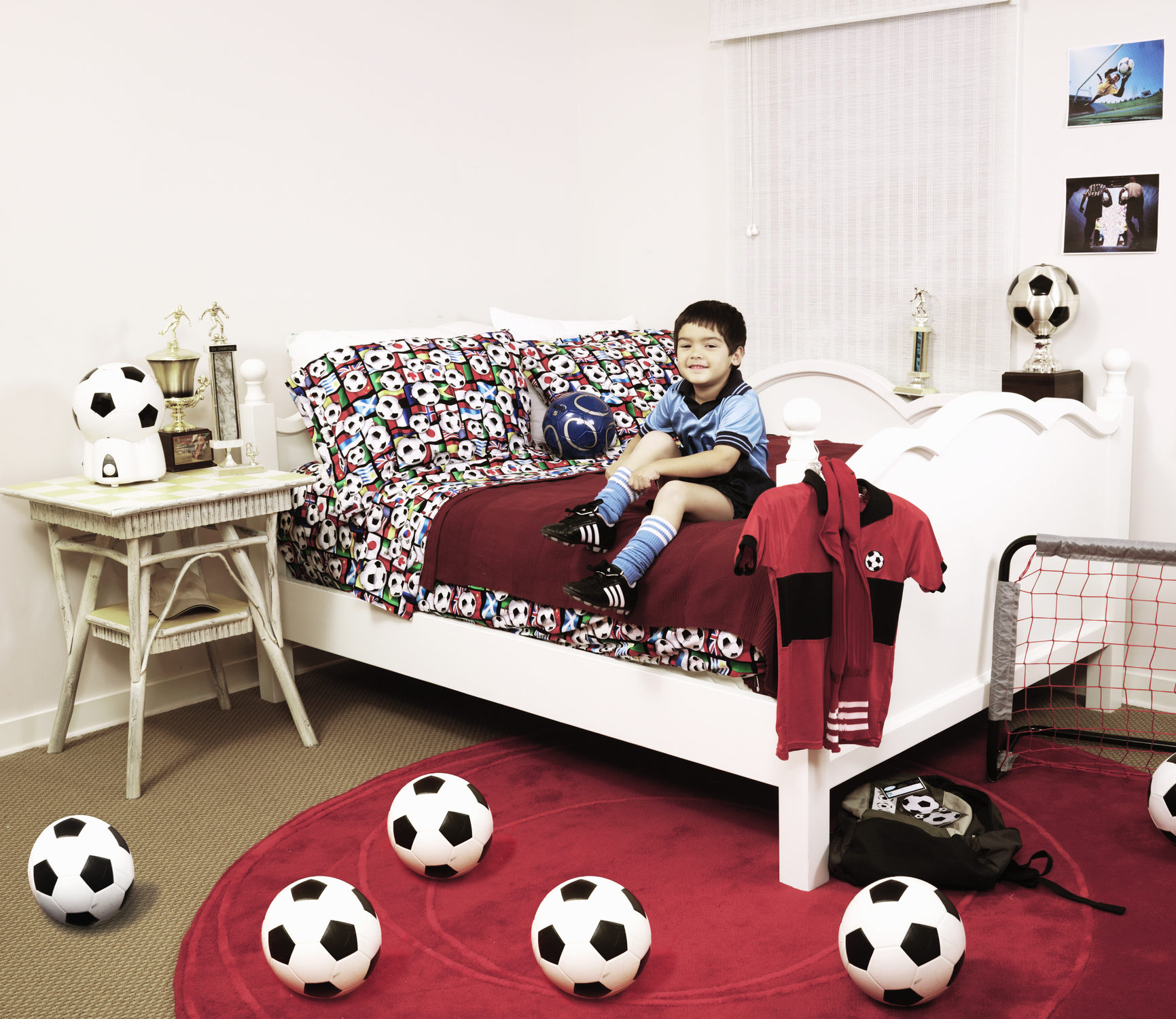 Inspiração de quarto temático para criança que ama futebol e já tem um time favorito.