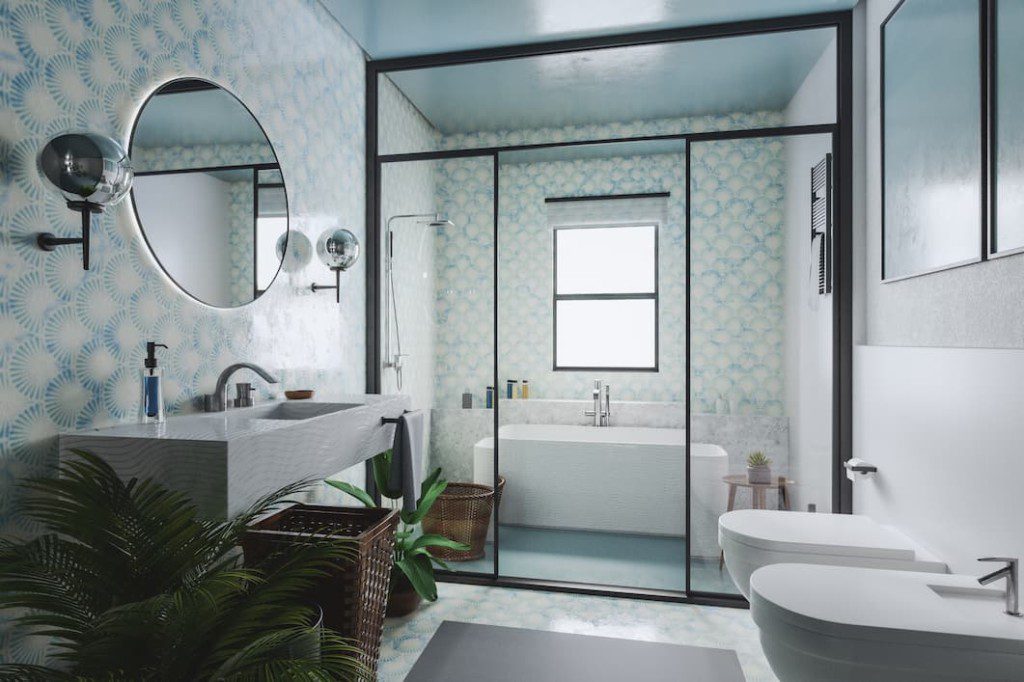 Banheiro retrô com espelho redondo no centro. Imagem disponível em Getty Images.