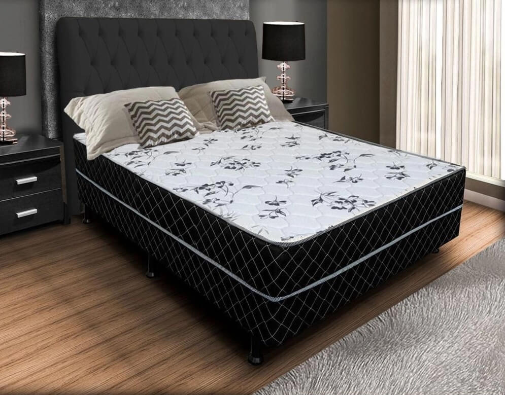 Foto que ilustra matéria sobre quanto custa mobiliar um apartamento mostra uma cama de casal do tipo box que já vem com um colchão acoplado em um quarto decorado