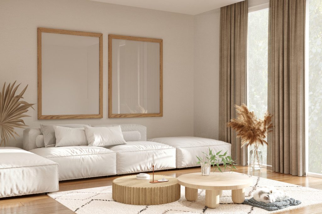 Living room with white modular sofa with wooden details.