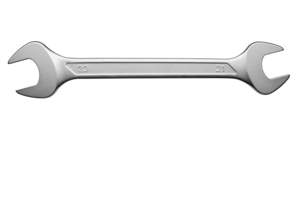 Imagem de um chave de boca metálica com duas pontas iguais em um fundo branco 