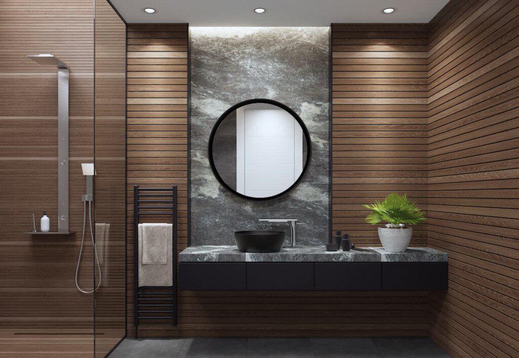 Banheiro luxuoso com paredes cobertas por madeira e marmorato.